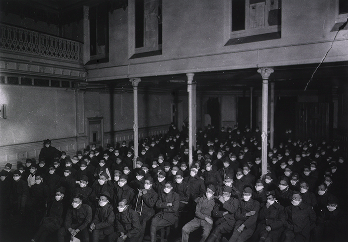 Photograph of American soldiers in France, masked against influenza, c.1919